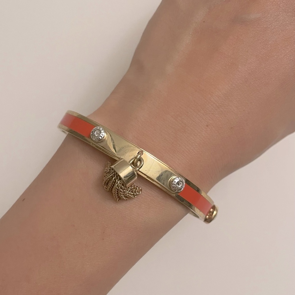 Henri Bendel Orange Tassel Bangle